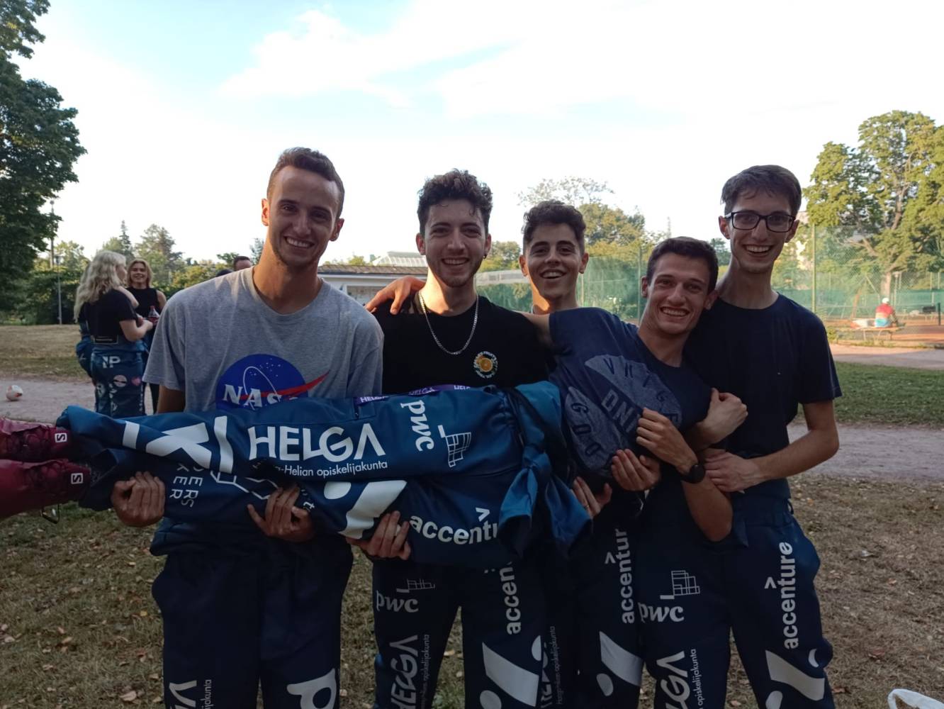 <p>Our students at a university festival, wearing the traditional overalls of HAAGA-HELIA University, together with their Spanish roommates. Photo: ©Grander & Frommelt</p>