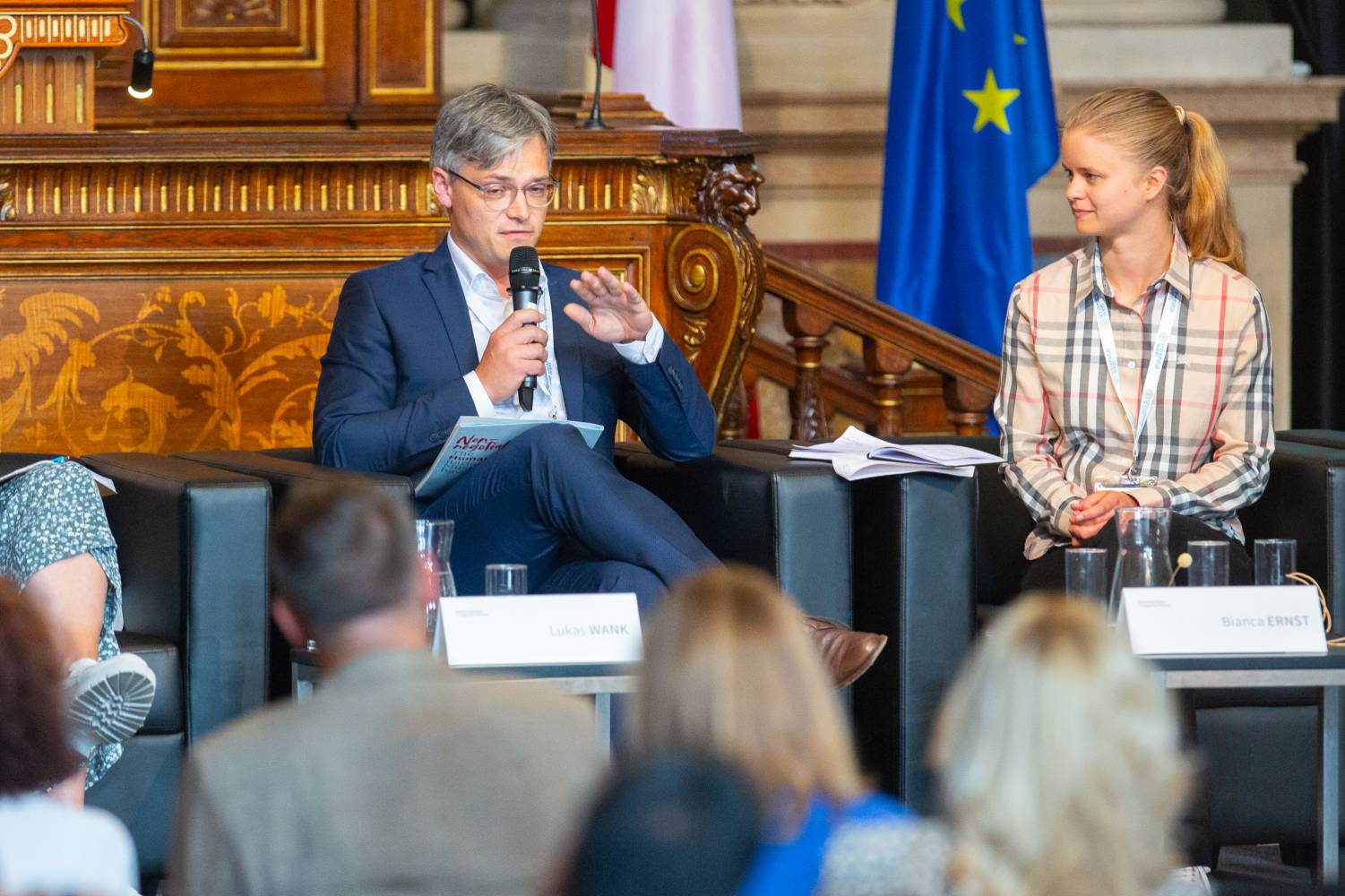 <p>Lukas Wank (AG Globale Verantwortung) & Bianca Ernst (MCI) at the Closing Statement; © Humanitarian Congress Vienna / Holly Kellner</p>