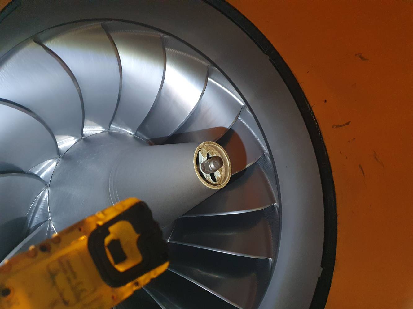 <p>The turbine seen from below: The students had the opportunity to see the refurbished runner and thus the structure of the open Francis turbine at the Untere Sill power plant at rest. Photo: © MCI / Berger</p>