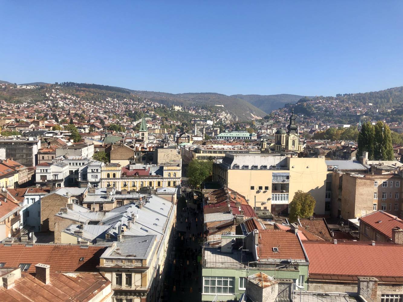 <p>Above the rooftops of Sarajevo overlooking the busy pedestrian zone Ferhadija. ©Ana Desnica</p>