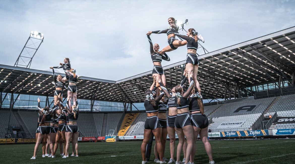 The Raiderettes, the cheerleading team of the Swarco Raiders Tirol, at practice in Innsbruck's Tivoli Stadium.